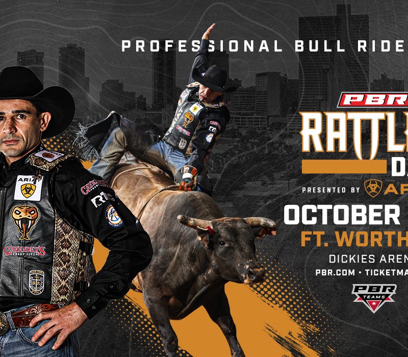 professional bull rider with hands on his hips wearing cowboy hat